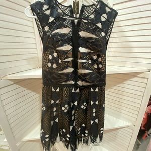 BCBG dress with sheer detail down the center, metallic silver and gold